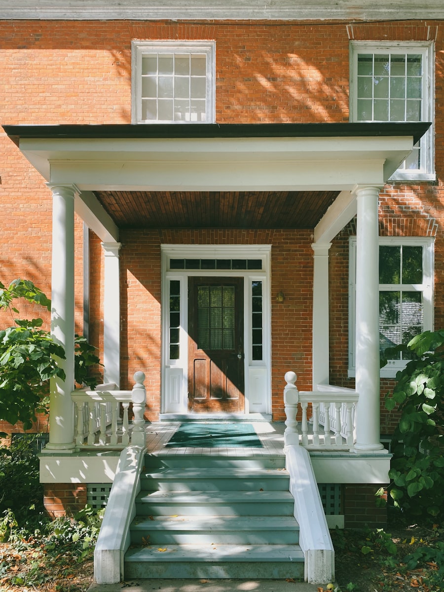 Classic White Entry Door on a Brick Craftsman